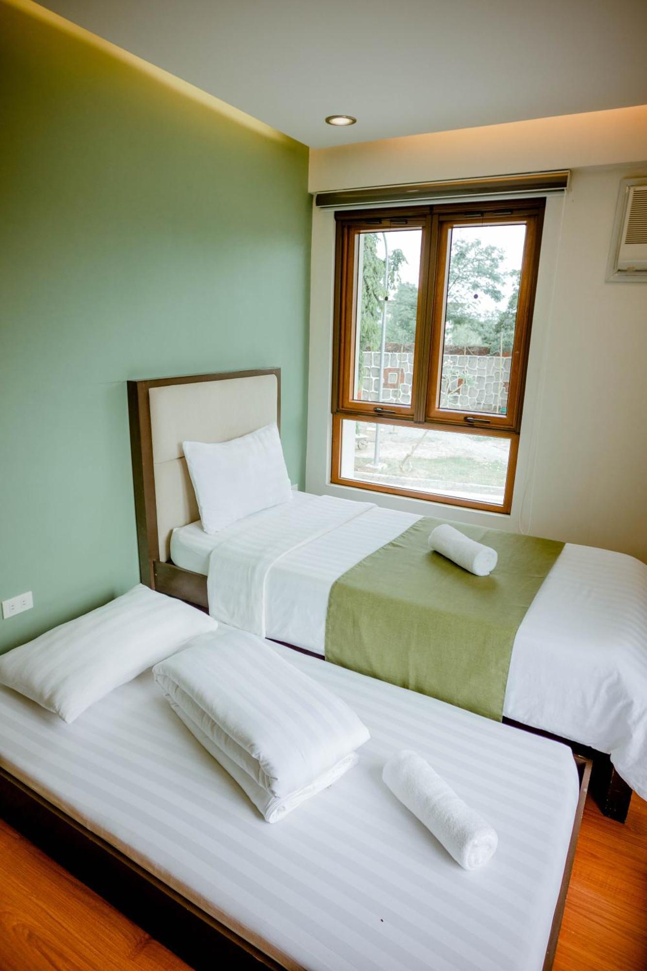 เดอะ ฟาร์มเฮาส์ บาย อีดีแอล Hotel Tarlac City ภายนอก รูปภาพ